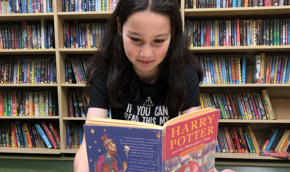 Emily reading Harry Potter